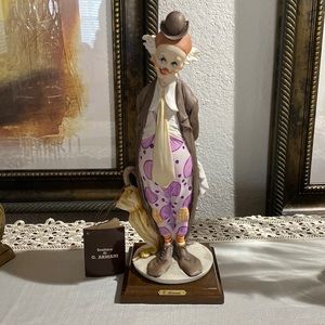 G. ARMANI di Scultura. Clown with Umbrella